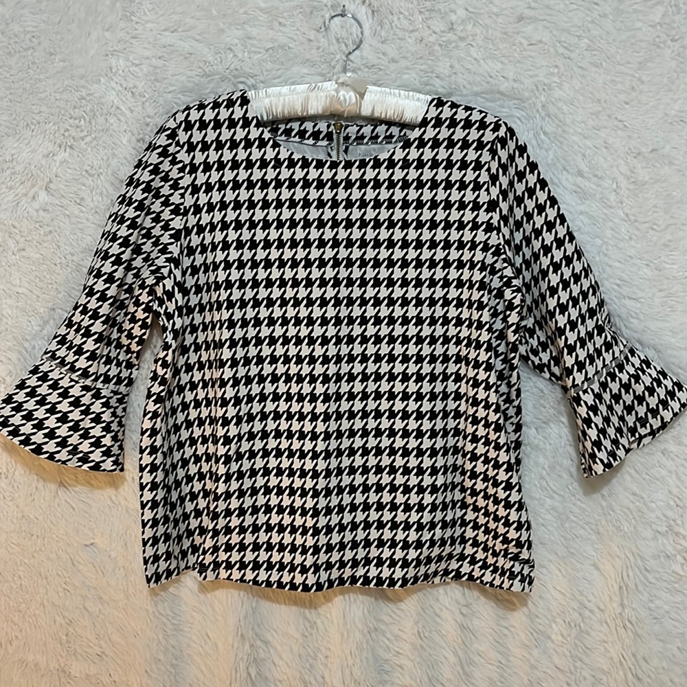 Black and white patterned ladies shirt.
